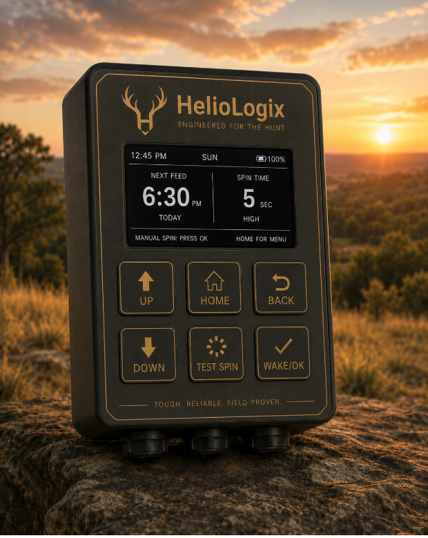 HelioLogix solar feeder timer on a rock at sunset, screen showing the next feed time
